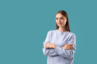 Photo of Portrait of beautiful woman on blue background. Space for text