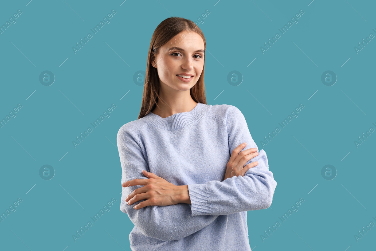 Photo of Portrait of beautiful woman on blue background