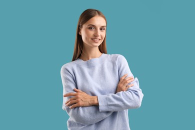 Photo of Portrait of beautiful woman on blue background