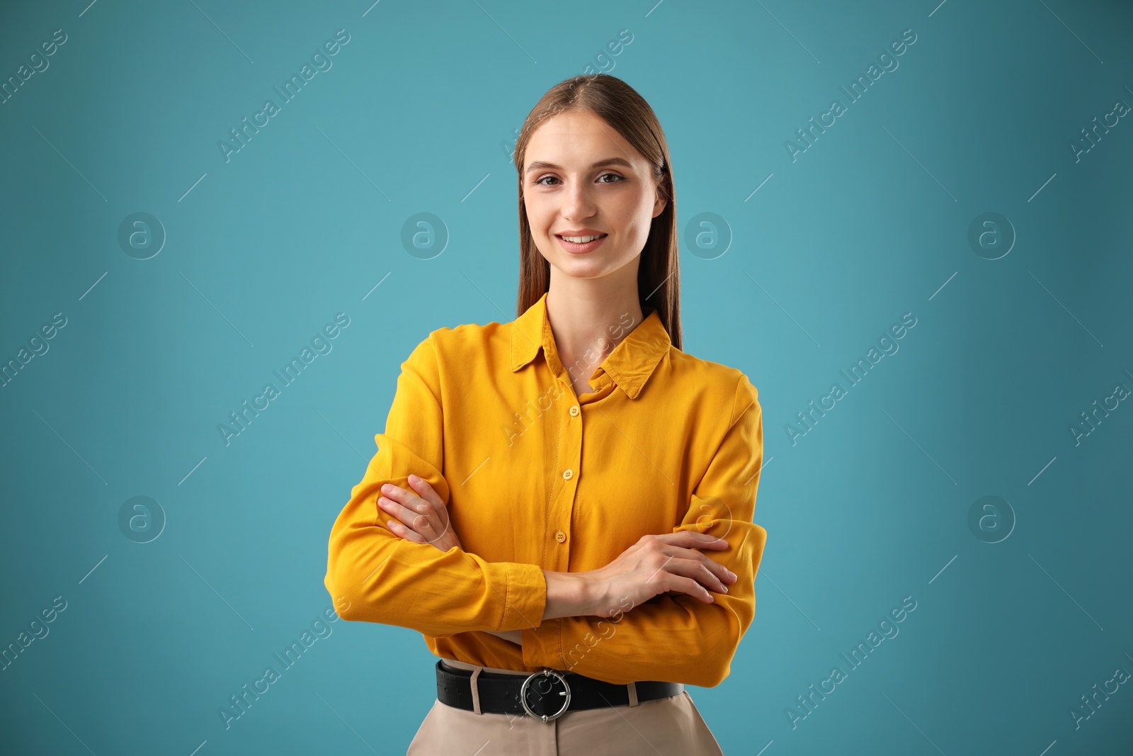 Photo of Portrait of confident woman on blue background