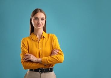 Photo of Portrait of confident woman on blue background. Space for text