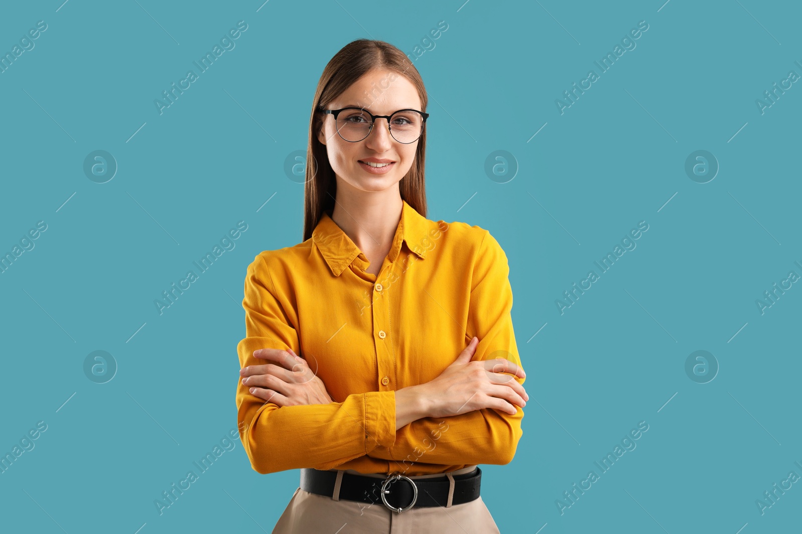 Photo of Portrait of confident woman on blue background