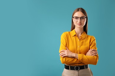 Photo of Portrait of confident woman on blue background. Space for text