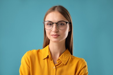 Photo of Portrait of confident woman on blue background