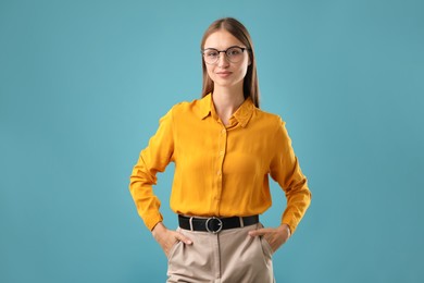Photo of Portrait of confident woman on blue background