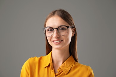 Photo of Portrait of confident woman on grey background