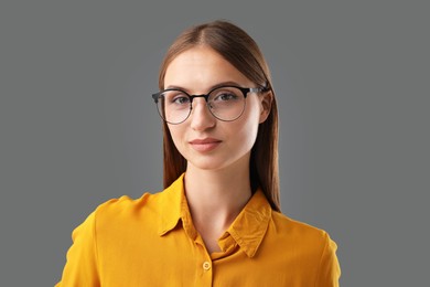 Photo of Portrait of confident woman on grey background
