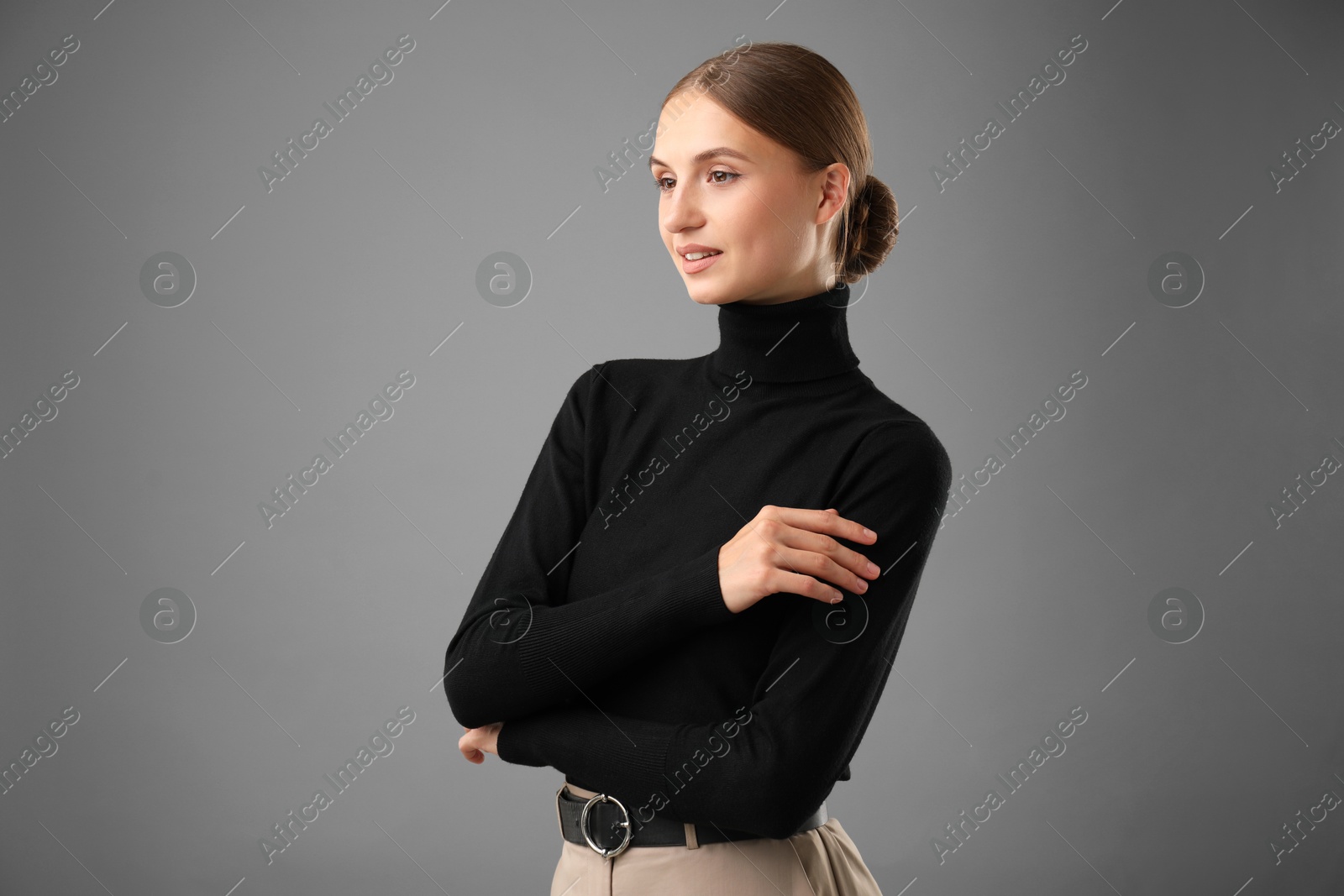 Photo of Portrait of confident woman on grey background