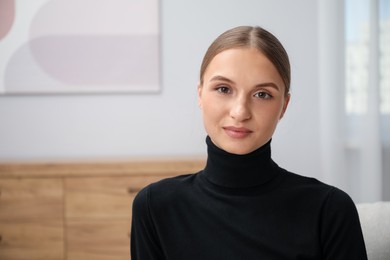 Photo of Portrait of positive elegant woman at home. Space for text