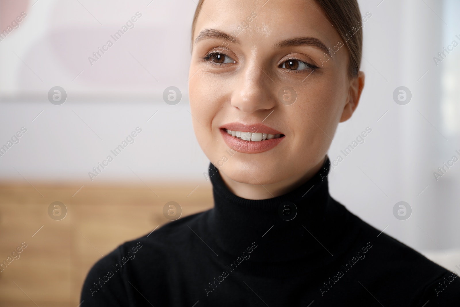 Photo of Portrait of positive elegant woman at home