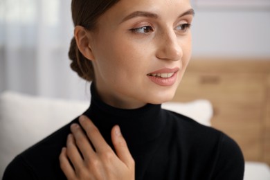 Photo of Portrait of positive elegant woman at home