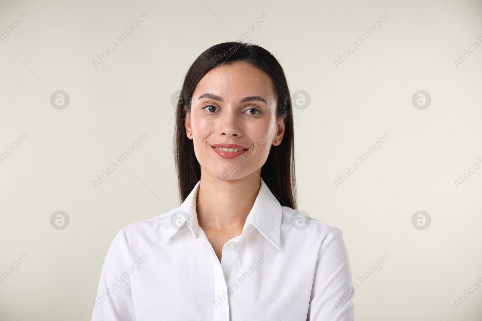Photo of Portrait of confident businesswoman on white background