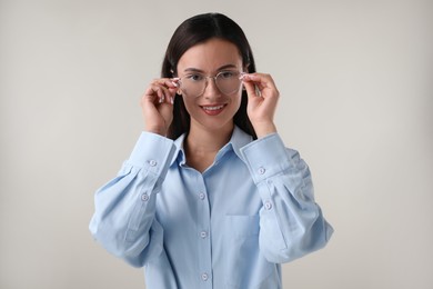Photo of Portrait of confident businesswoman on white background