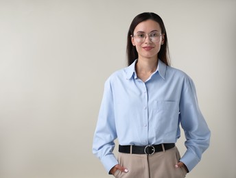Photo of Portrait of confident businesswoman on white background. Space for text