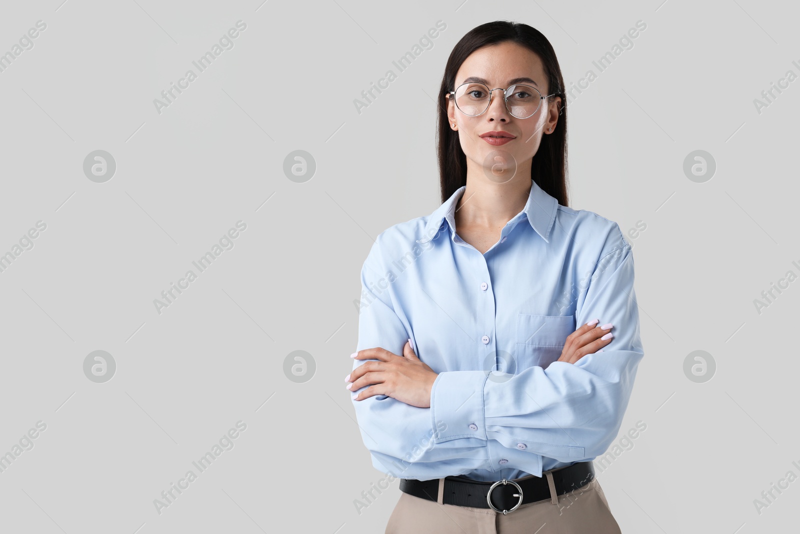 Photo of Portrait of confident businesswoman on white background. Space for text