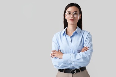 Photo of Portrait of confident businesswoman on white background. Space for text