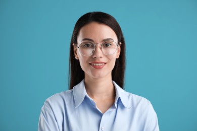 Photo of Portrait of confident businesswoman on blue background