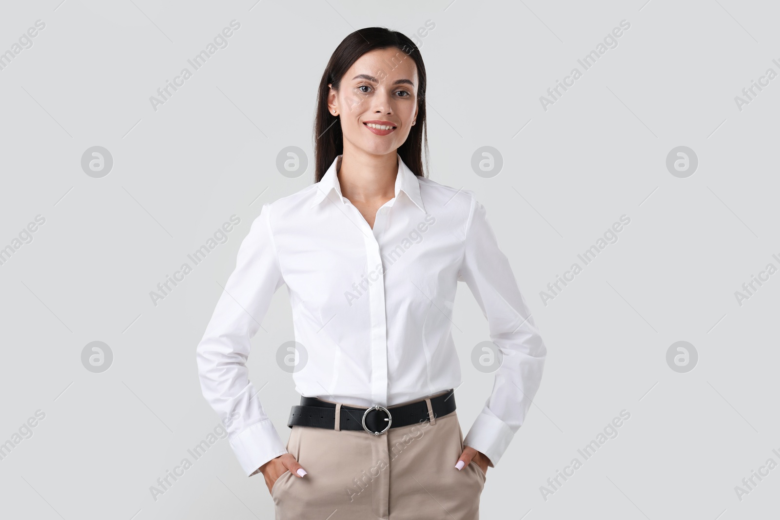 Photo of Portrait of confident businesswoman on white background
