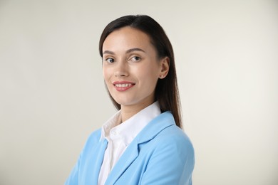 Photo of Portrait of confident businesswoman on white background
