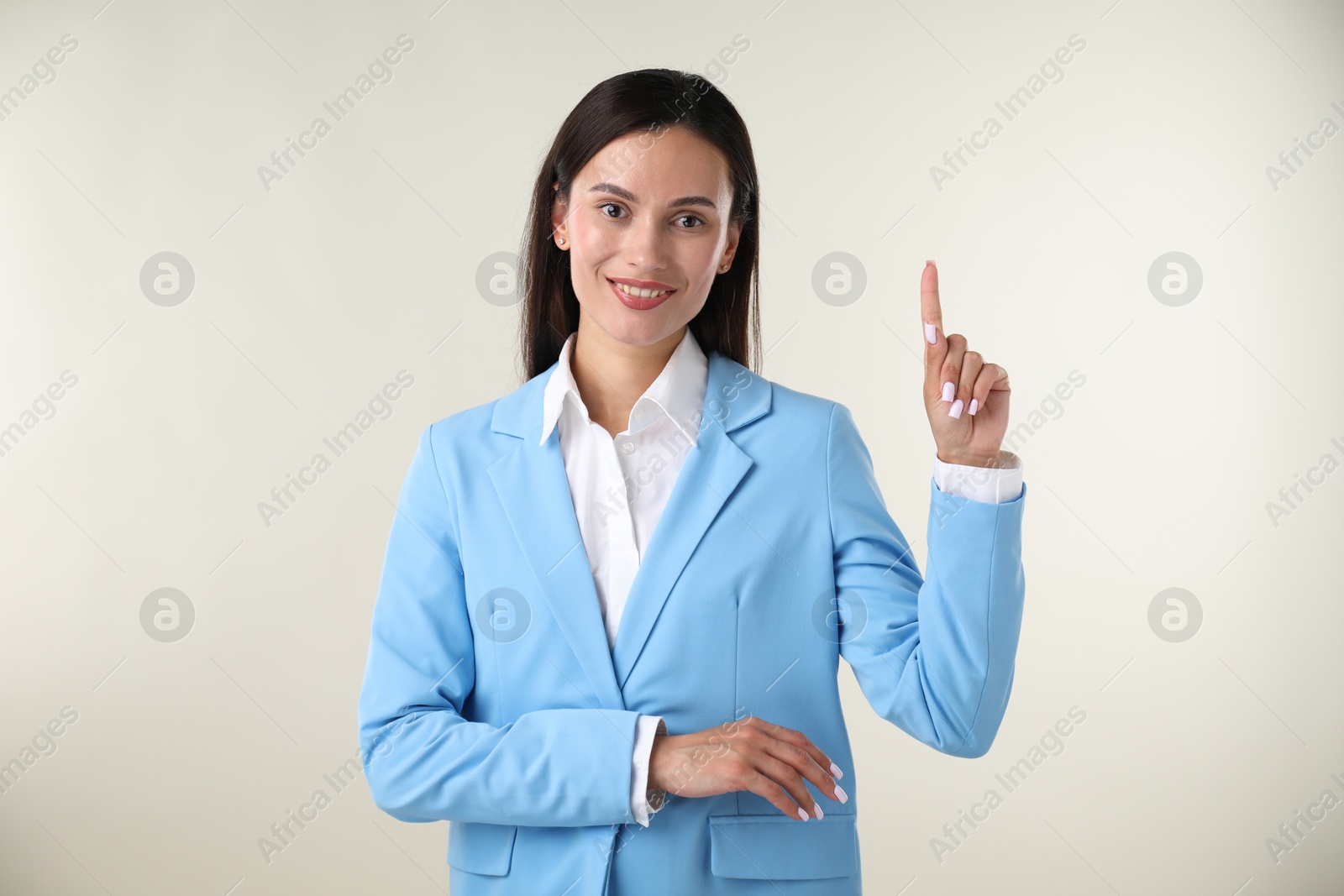 Photo of Confident businesswoman having idea on white background