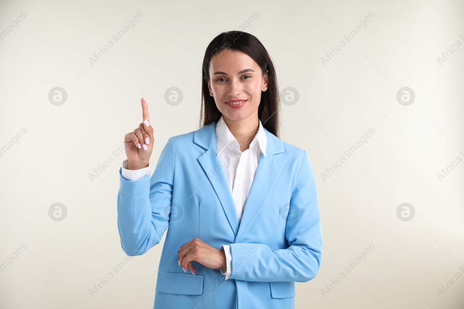 Photo of Confident businesswoman having idea on white background