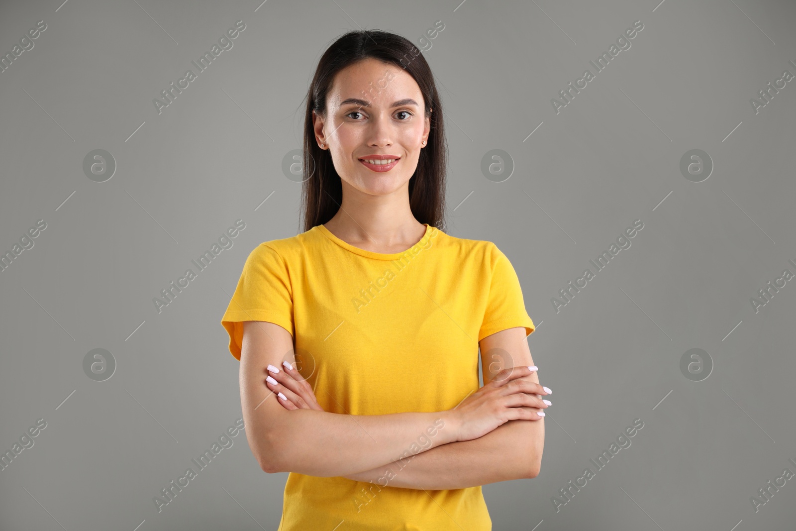 Photo of Portrait of beautiful woman on light grey background