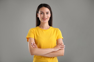 Photo of Portrait of beautiful woman on light grey background
