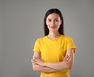 Photo of Portrait of beautiful woman on light grey background