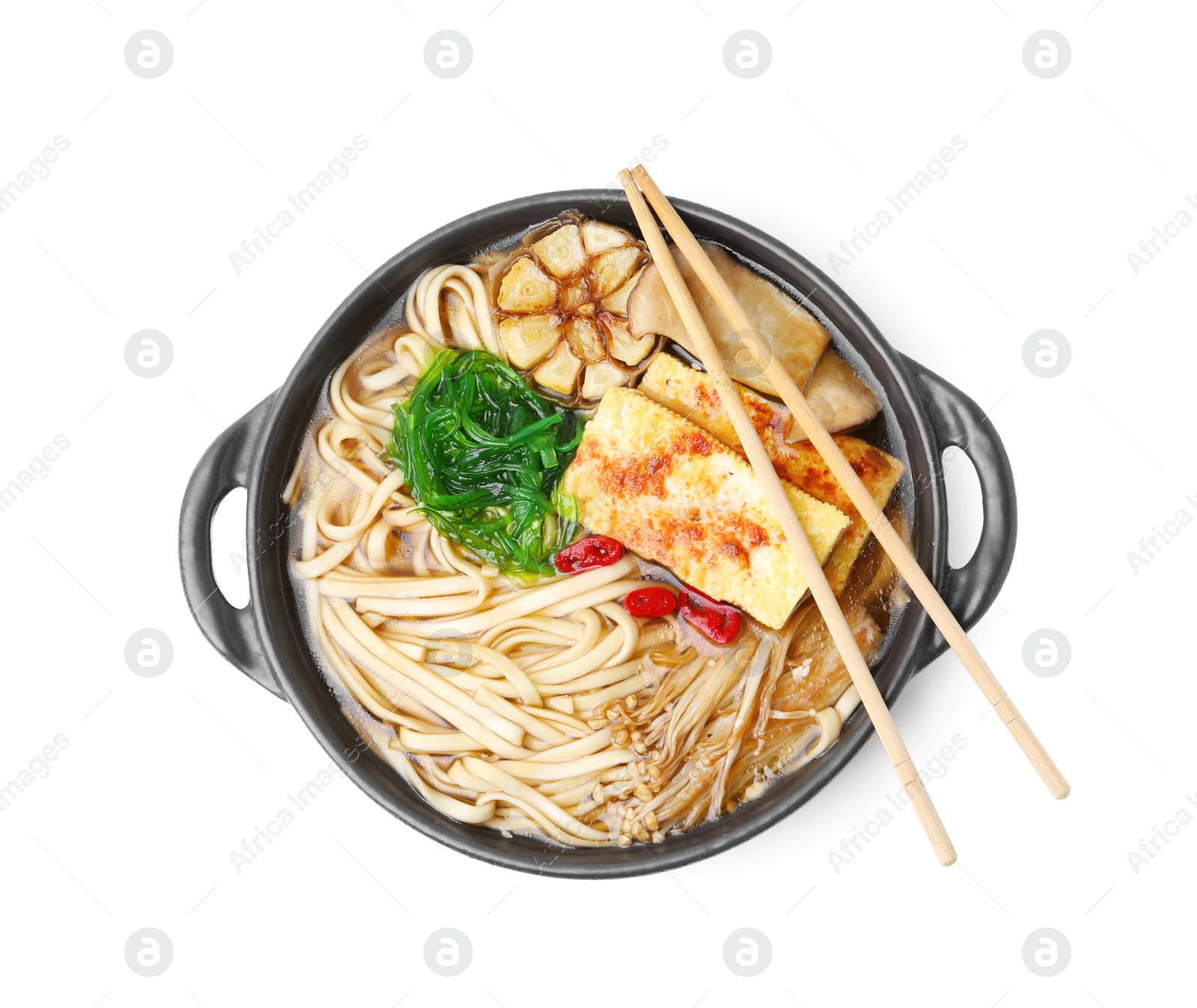 Tasty ramen with enoki and king oyster (eryngii) mushrooms isolated on white, top view Photo of Tasty ramen with enoki and king oyster (eryngii) mushrooms isolated on white, top view