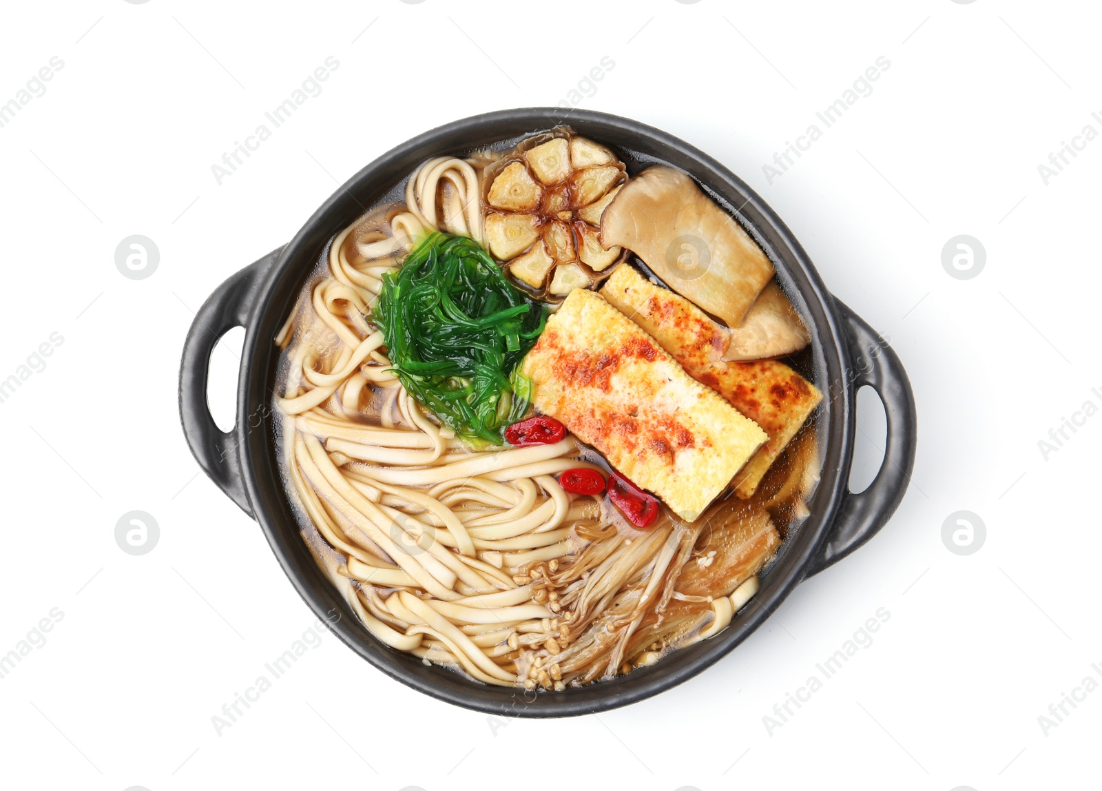 Tasty ramen with enoki and king oyster (eryngii) mushrooms isolated on white, top view Photo of Tasty ramen with enoki and king oyster (eryngii) mushrooms isolated on white, top view