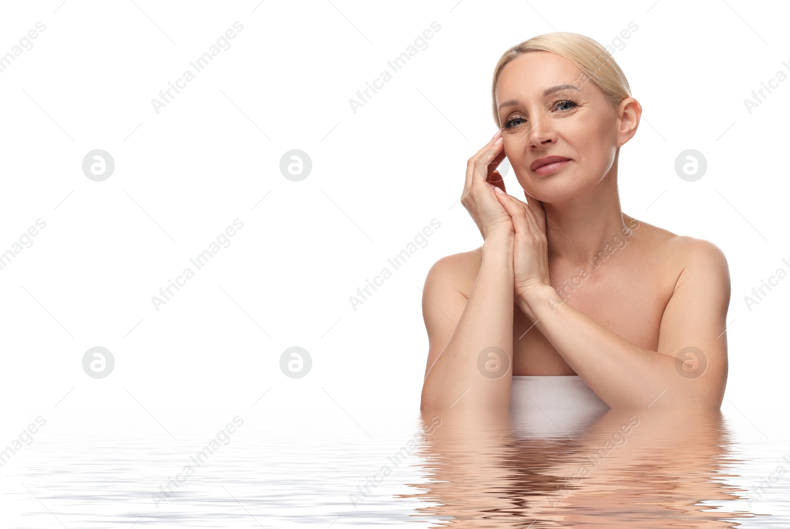 Image of Beautiful woman with perfect skin against white background. Her reflection in rippled water