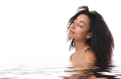 Image of Beautiful woman with perfect skin against white background. Her reflection in rippled water