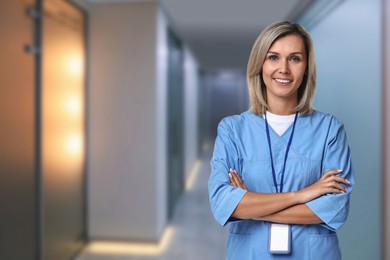 Image of Medical assistant in hospital hall. Healthcare worker