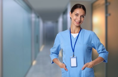 Image of Medical assistant in hospital hall. Healthcare worker