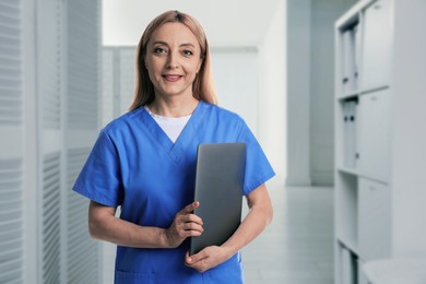 Image of Medical assistant in hospital office. Healthcare worker