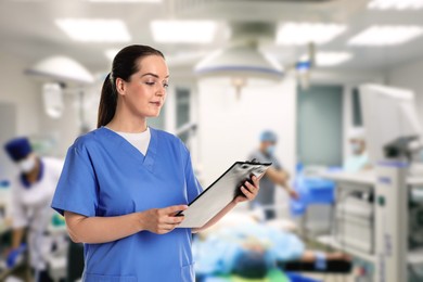 Image of Medical assistant in surgery room. Healthcare worker