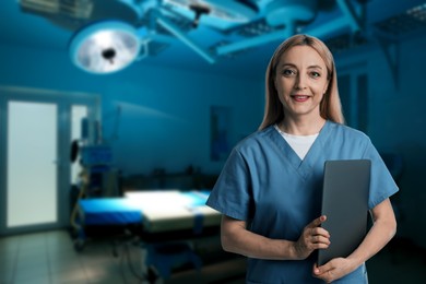 Image of Medical assistant in surgery room. Healthcare worker