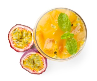 Photo of Tasty passion fruit drink with mint and fresh fruits isolated on white, top view
