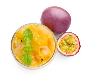 Photo of Tasty passion fruit drink with mint and fresh fruits isolated on white, top view