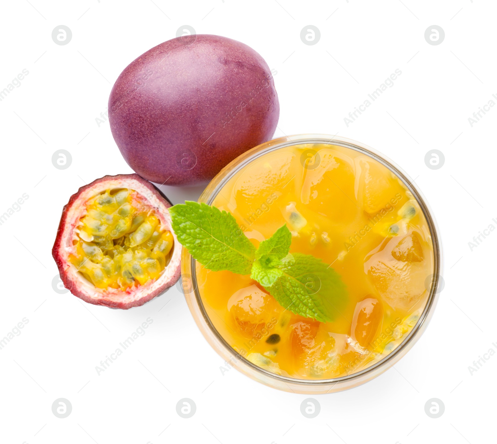 Photo of Tasty passion fruit drink with mint and fresh fruits isolated on white, top view