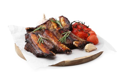 Photo of Roasted beef ribs with spices and tomatoes isolated on white