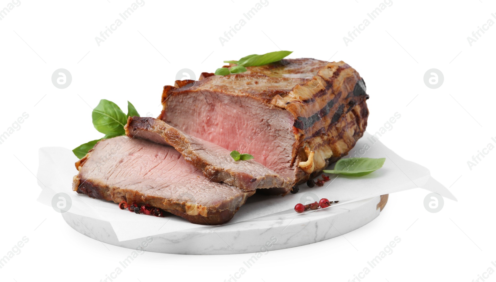 Photo of Delicious baked beef meat and spices isolated on white