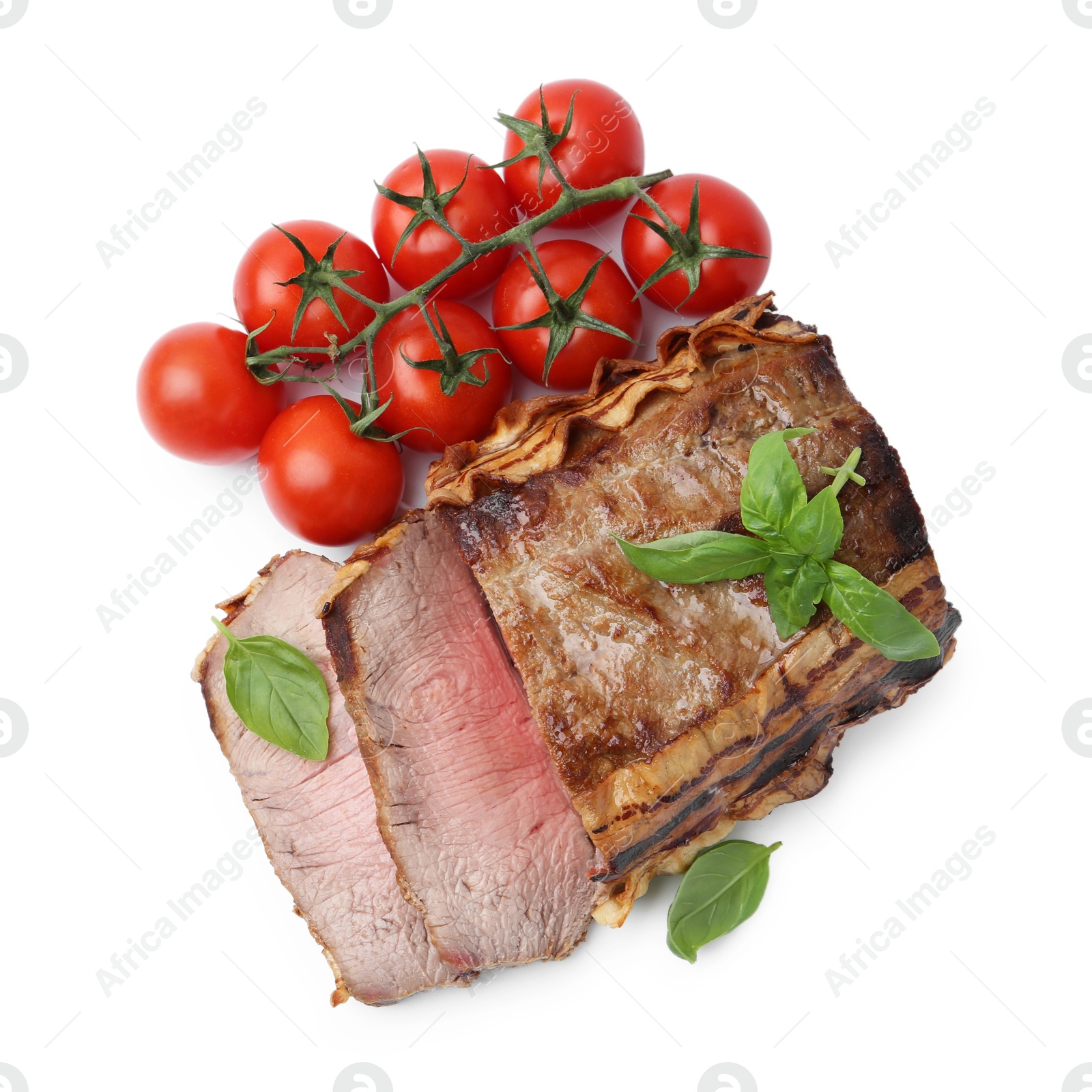 Photo of Delicious baked beef meat, tomatoes and basil isolated on white, top view