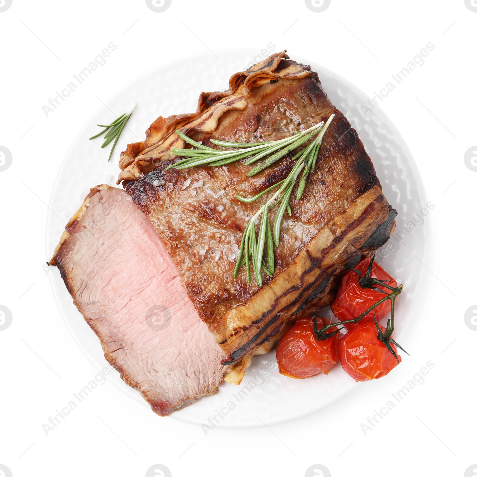 Photo of Delicious baked beef meat, tomatoes, rosemary and salt isolated on white, top view