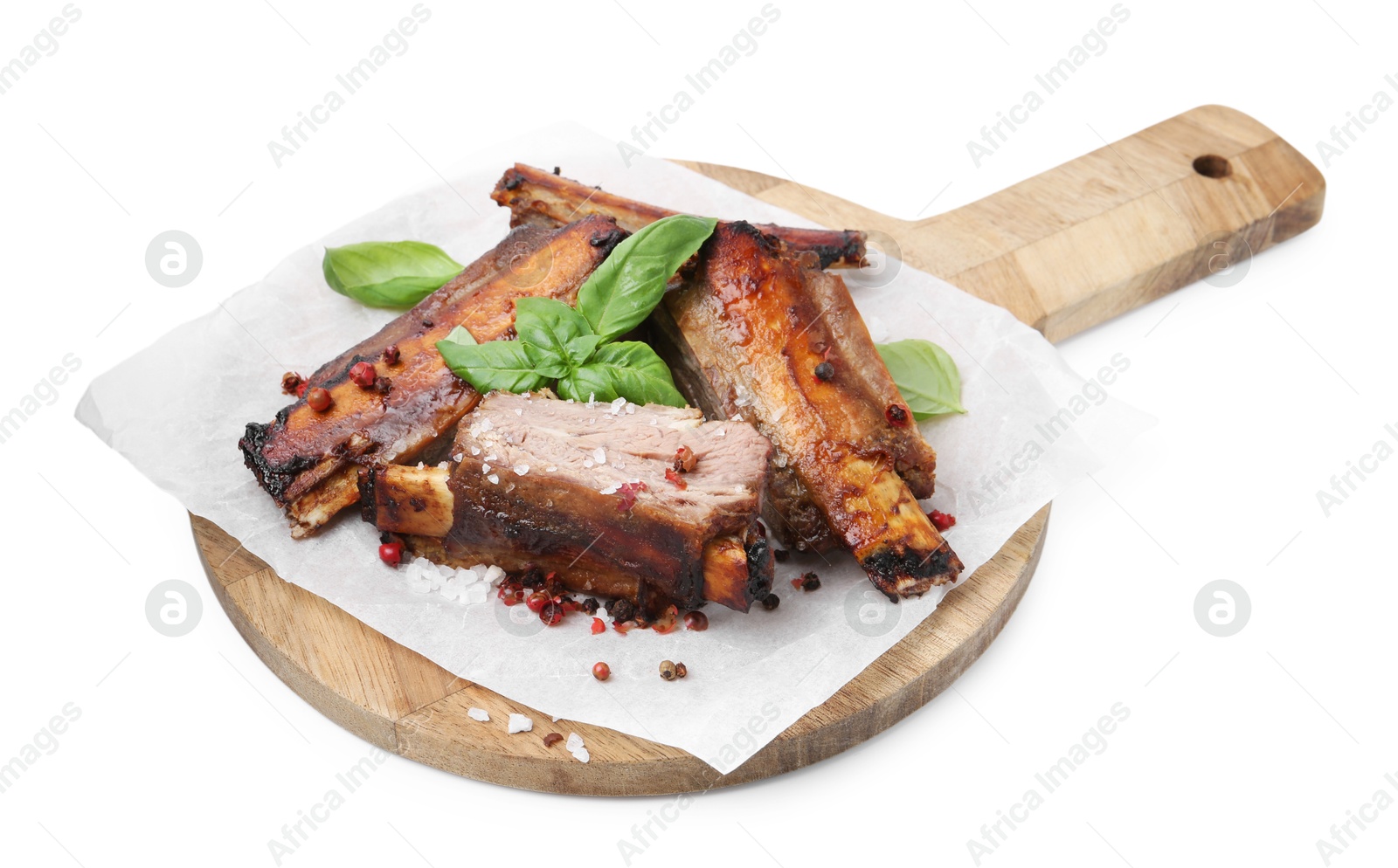 Roasted beef ribs with spices isolated on white Photo of Roasted beef ribs with spices isolated on white