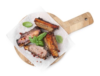Photo of Roasted beef ribs with spices isolated on white, top view