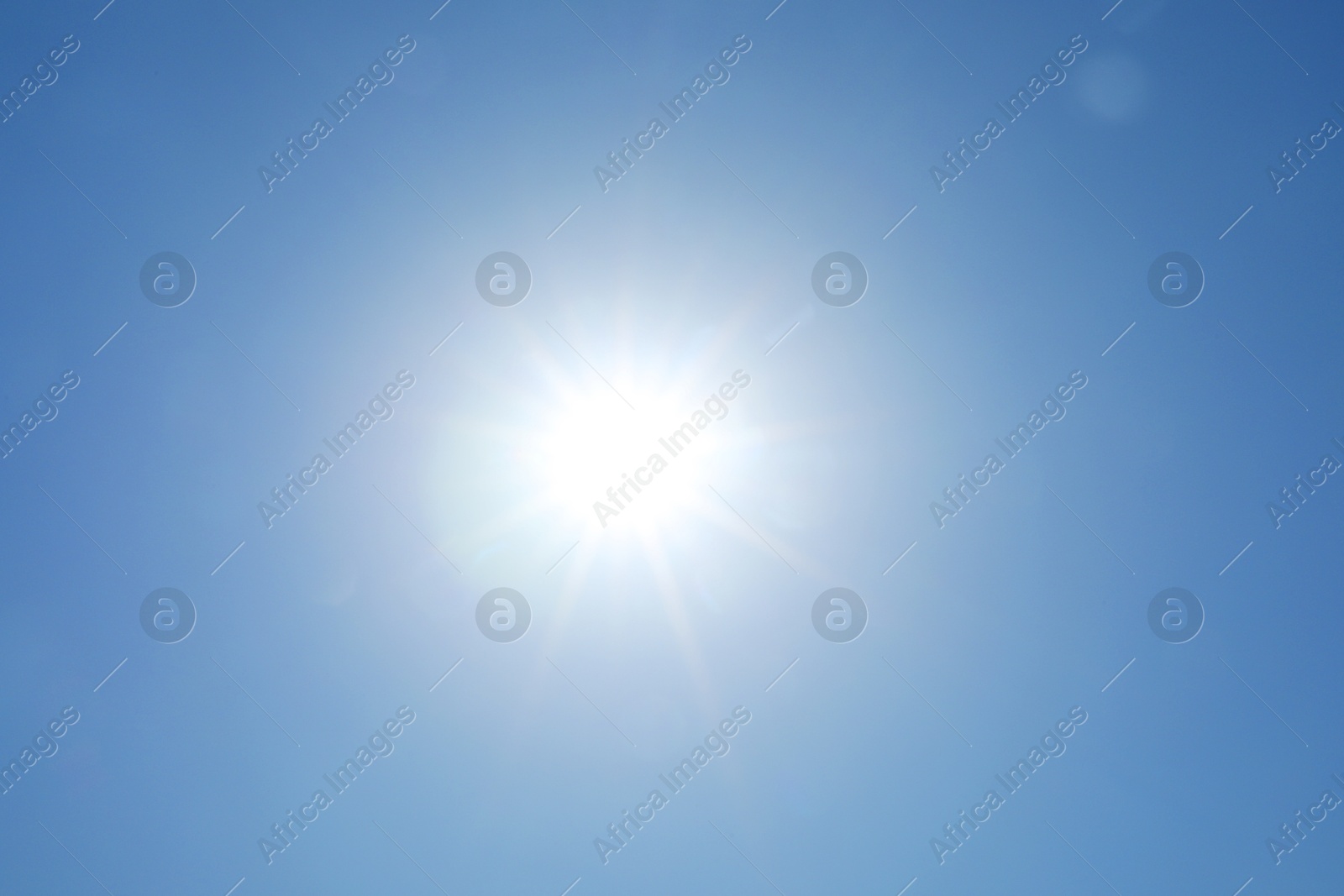 Photo of Beautiful blue sky on sunny day, bottom view