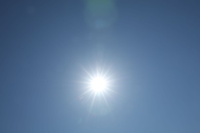 Photo of Beautiful blue sky on sunny day, bottom view