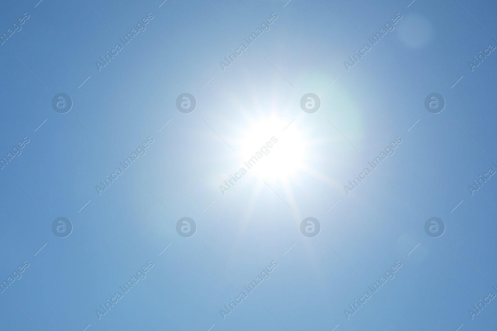 Photo of Beautiful blue sky on sunny day, bottom view