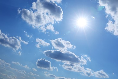 Photo of Beautiful blue sky with clouds on sunny day, low angle view